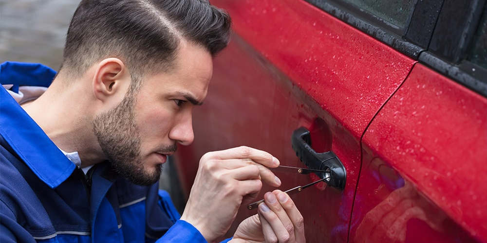 Photo Of Employee Opening The Locked Up Car